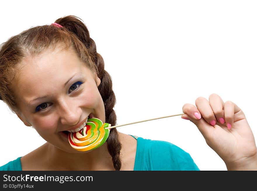 Woman biting lolipop with perfect teeth. Woman biting lolipop with perfect teeth.