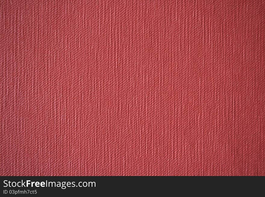 Bright red wallpaper with structure