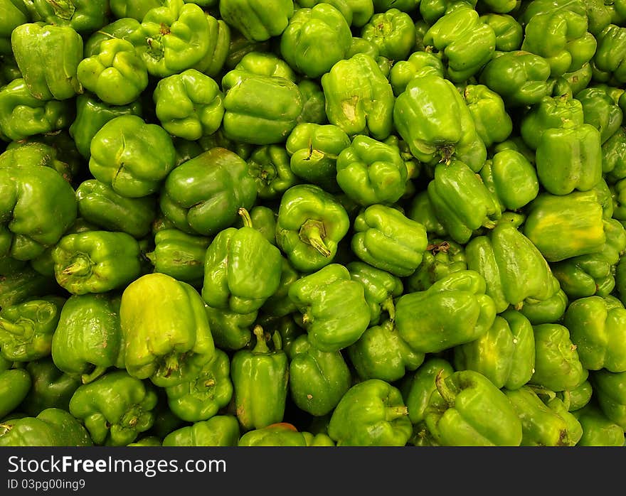 A bunch of green bell pepper.