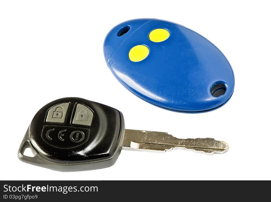 Car key and remote electric gate on a white background