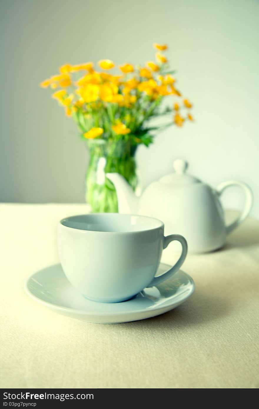 Cup of tea on table canvas