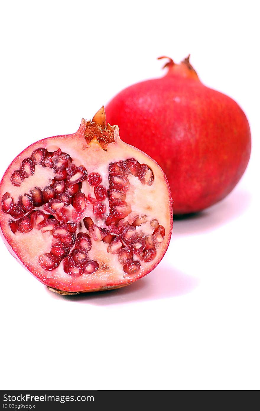 Pomegranate fruit on white background