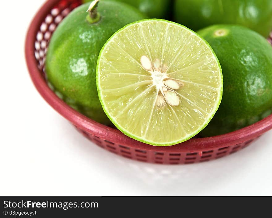 Group of lime and half lime in basket. Group of lime and half lime in basket.