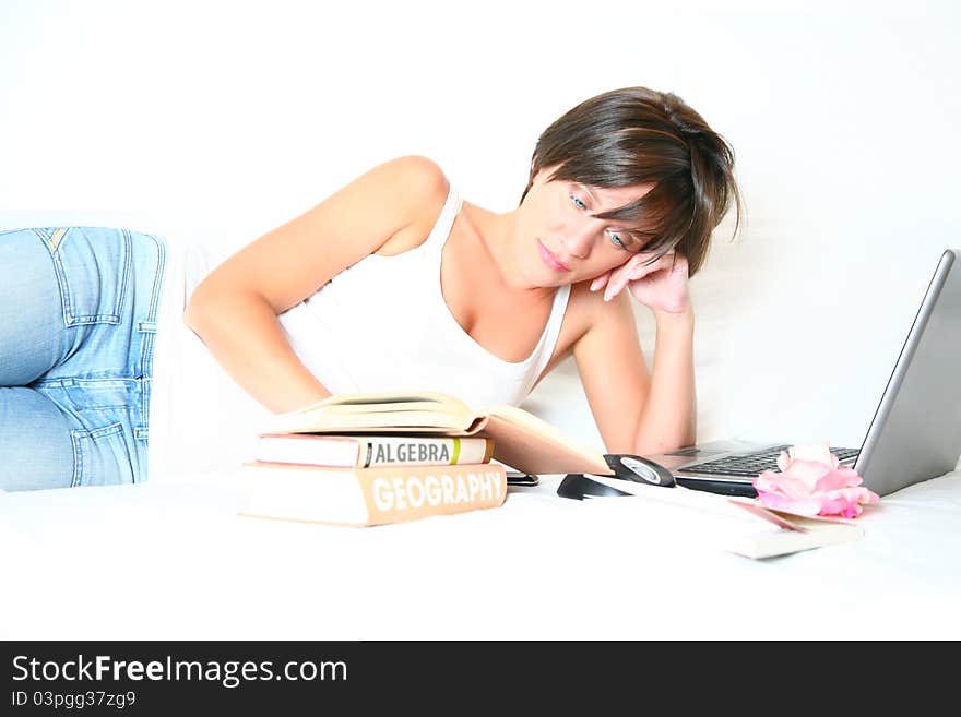 Female Student With Books And Laptop