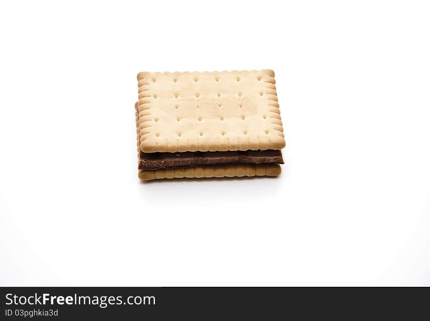 Cookies with chocolate and onto white background