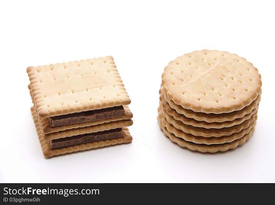 Cookies with chocolate and onto white background