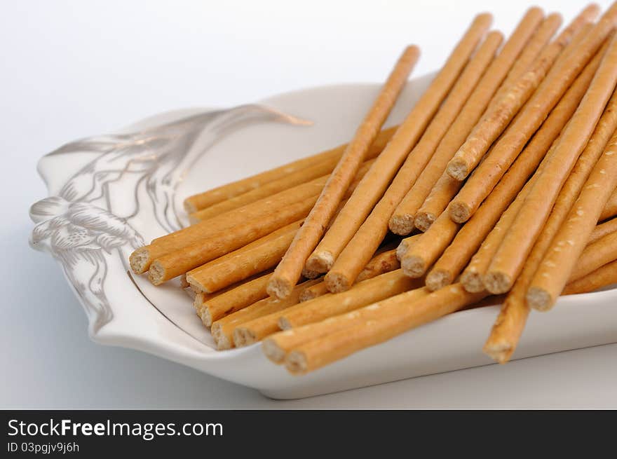 Bread sticks on plate. National food in Ukraine.