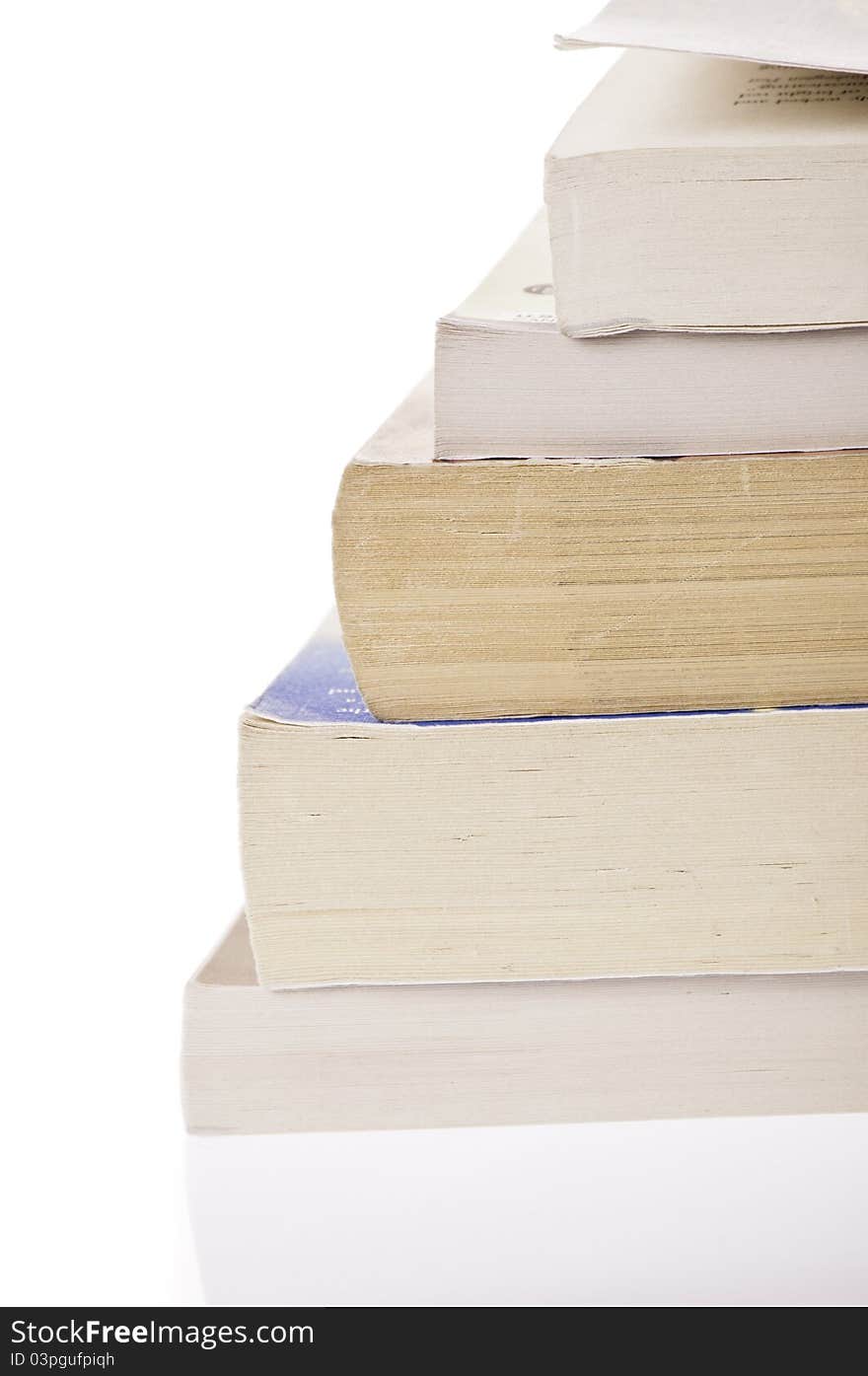 Stack of five, old discoloured books, isolated on white backgroud. Stack of five, old discoloured books, isolated on white backgroud