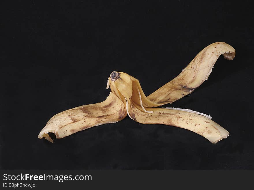 Banana skin isolated on black background