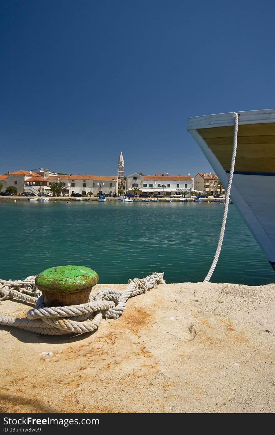 Berthed ship in Turanj