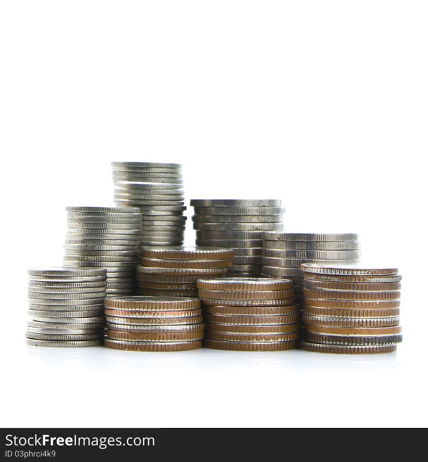 Heap of coins isolated on white background