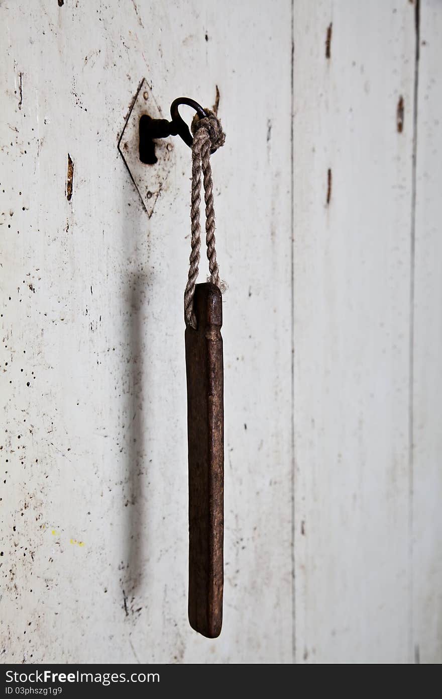 More than one hundred years old for this key and this door, Italy, Asti town. More than one hundred years old for this key and this door, Italy, Asti town