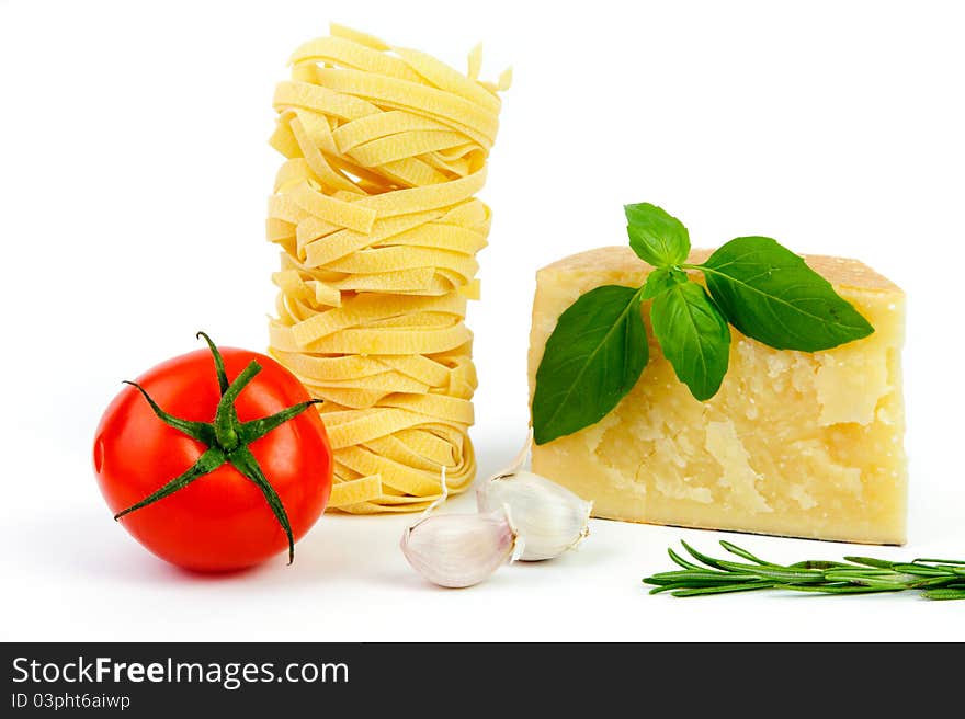 An image of cheese, tomato, pasta, garlic and basil. An image of cheese, tomato, pasta, garlic and basil