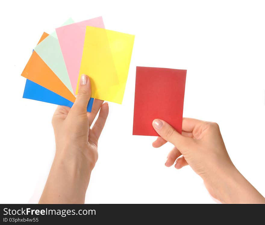 Multi-colored cards in hands