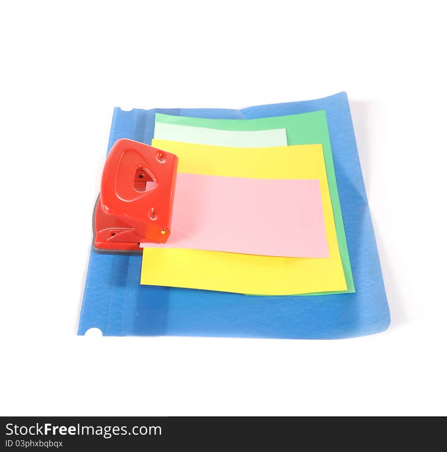 Folder with a paper and a puncher