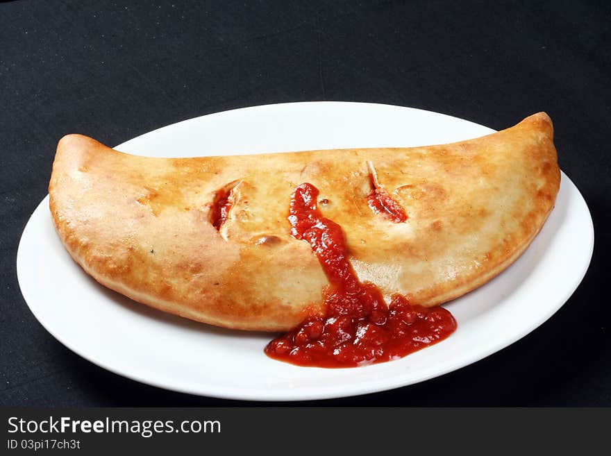 Spicy and tasty panzerotti for lunch at home