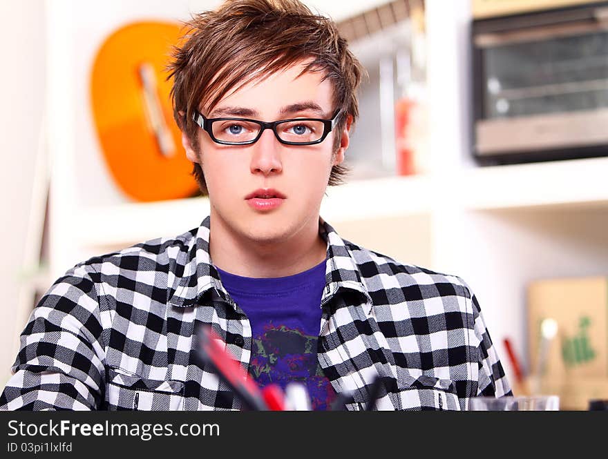 Young student studying at home