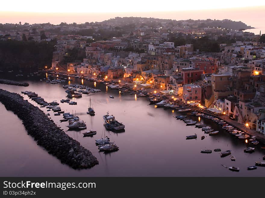 The photos portrayed the port Coricelli, typical place in the Gulf of Naples, more specifically the island of Procida. Inside the harbor you can see dozens of fishing boats and colorful houses typical of the Mediterranean region, the sea. The photos portrayed the port Coricelli, typical place in the Gulf of Naples, more specifically the island of Procida. Inside the harbor you can see dozens of fishing boats and colorful houses typical of the Mediterranean region, the sea.