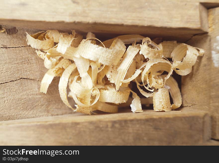 Wooden chips into old carpenter's wood planer