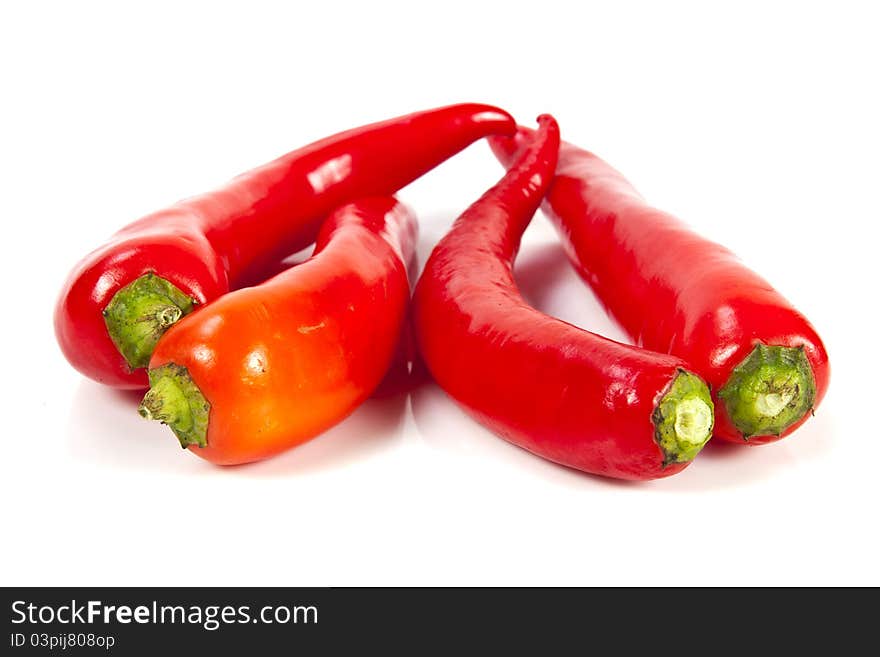 Fresh red hot pepper on a white background. Fresh red hot pepper on a white background