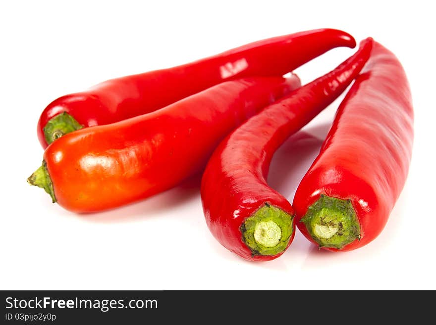 Fresh red hot pepper on a white background. Fresh red hot pepper on a white background