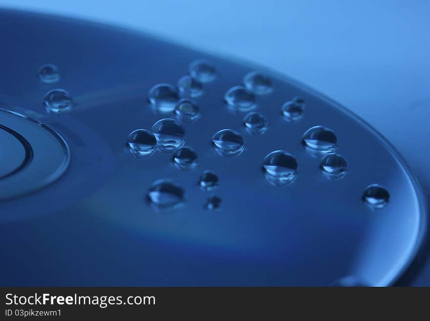 Abstract blue water drops on disk. Abstract blue water drops on disk