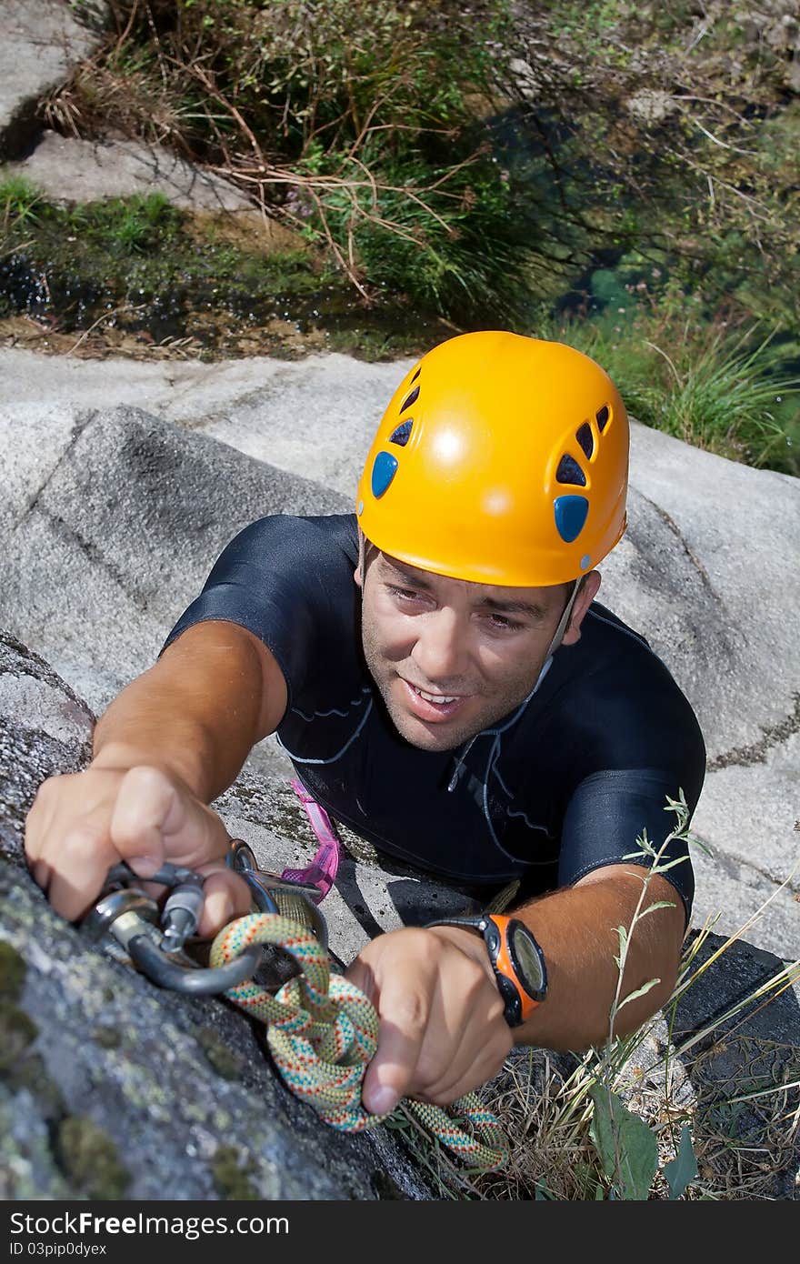 Men prepering to rappeling on waterfall. Men prepering to rappeling on waterfall