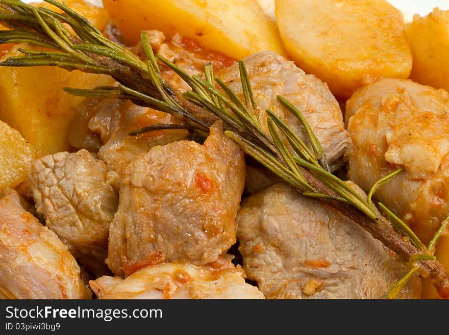 Meat stew with potatoes and rosemary