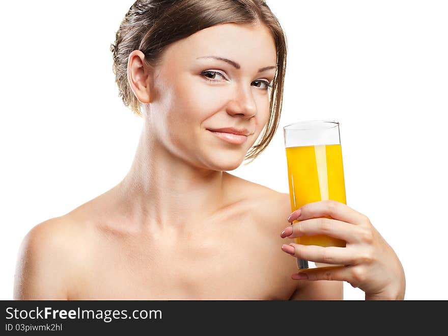 Young beautiful woman drinking orange juice isolated on a white background