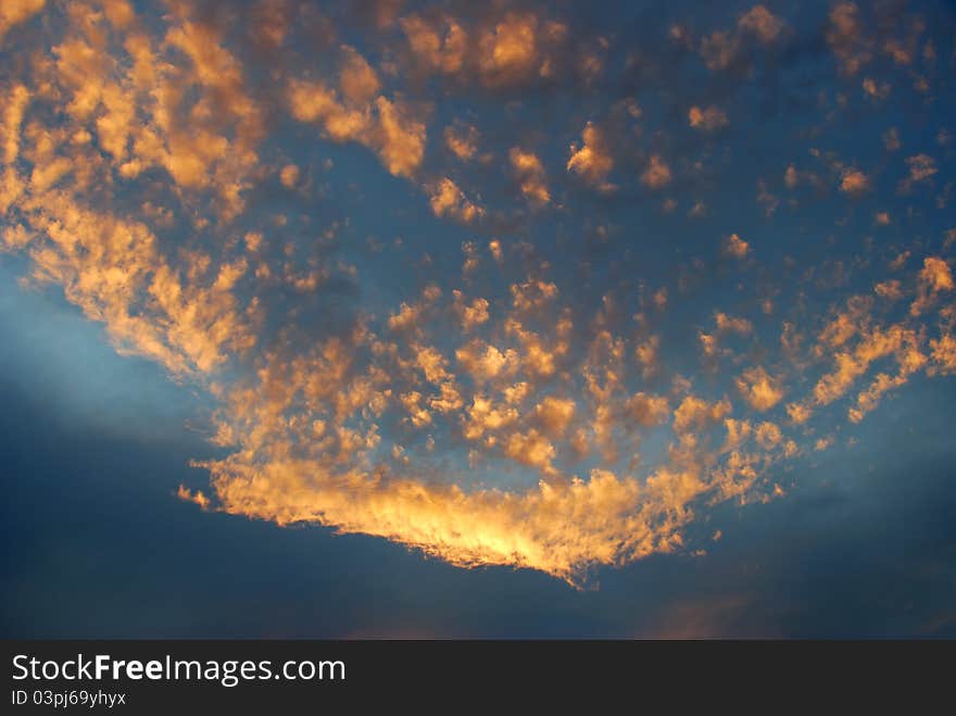 The colorful clouds and sky during sunset just out of my window. The colorful clouds and sky during sunset just out of my window