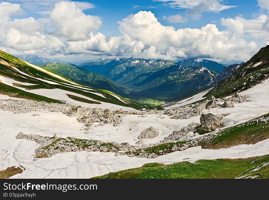 Snow and stones in the North Caucasus mountains. Russia. Snow and stones in the North Caucasus mountains. Russia.