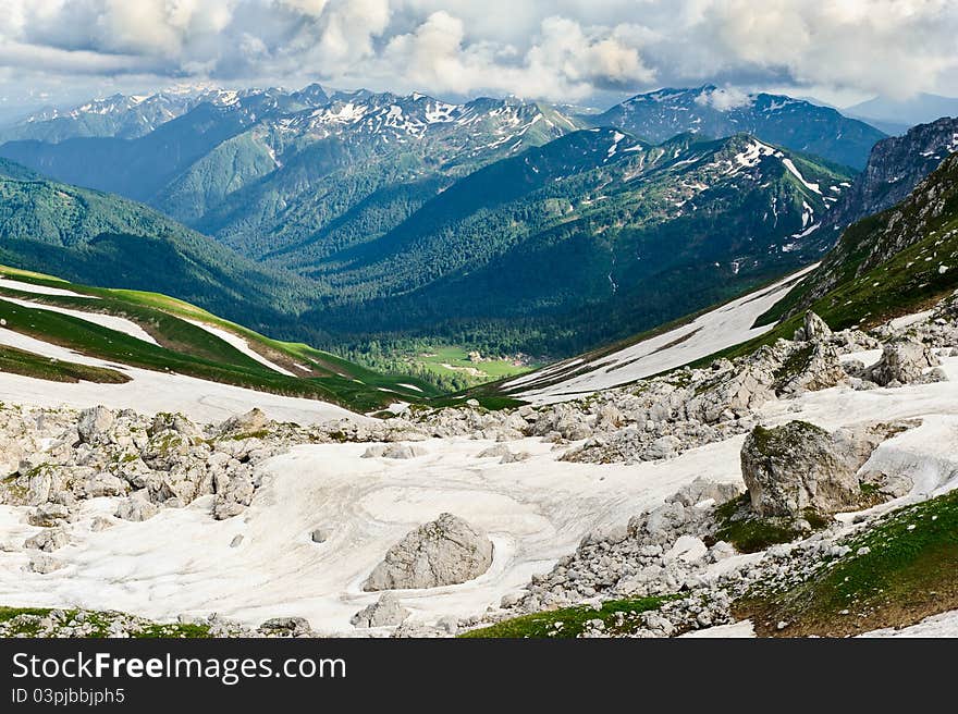 Snow and stones in the North Caucasus mountains. Russia. Snow and stones in the North Caucasus mountains. Russia.