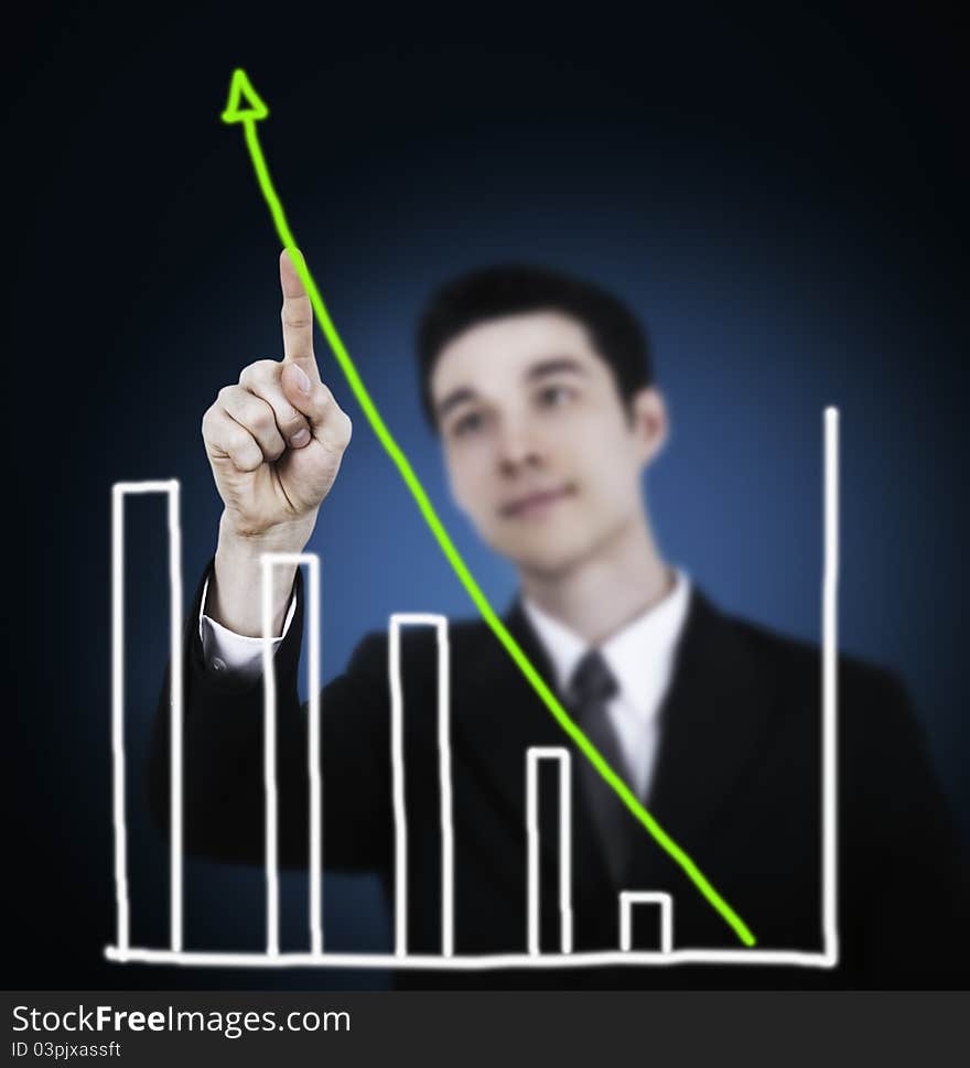 Businessman touching graph, representing business growth. Businessman touching graph, representing business growth.