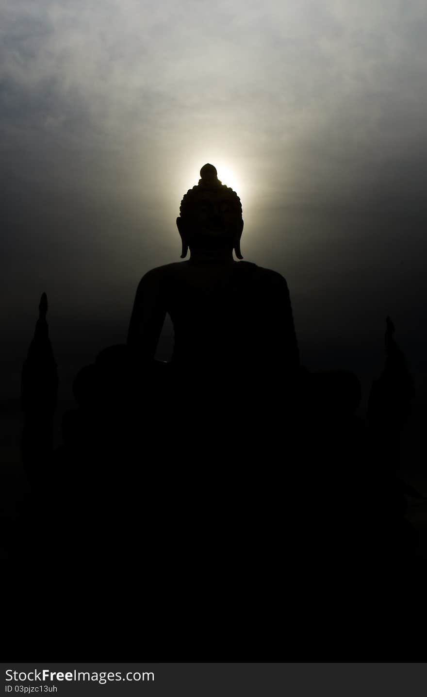 Golden bhuda in black shadow of thailand. Golden bhuda in black shadow of thailand