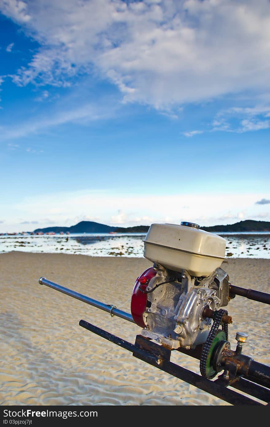 Long-tailed boat engine on the beach