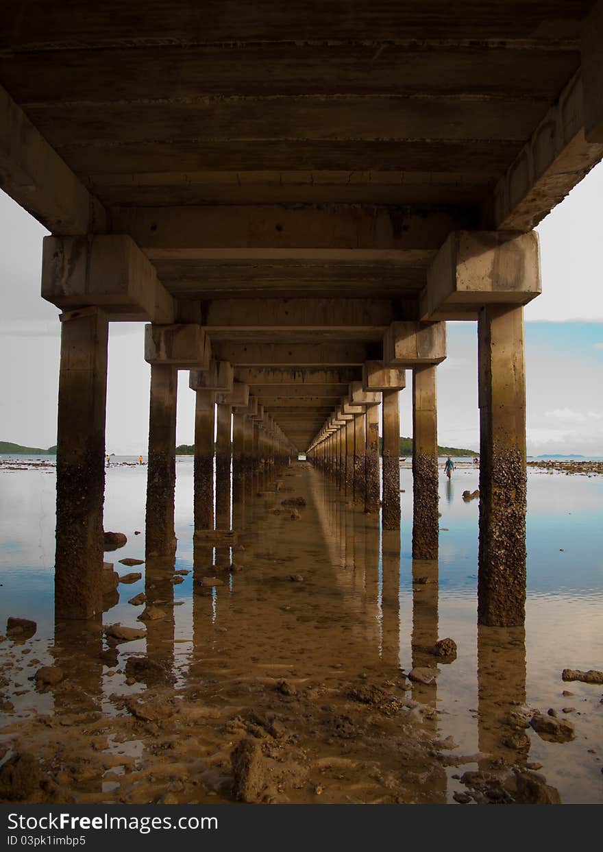 Blue sky beach sea and pier. Blue sky beach sea and pier