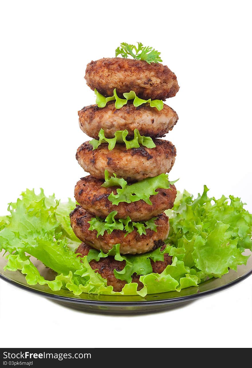 Cutlets on salad leaves