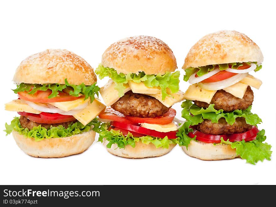 Big hamburgers on white background