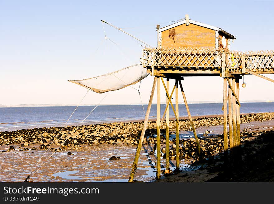 Pier with fishing net in Gironde Department, Aquitaine, France