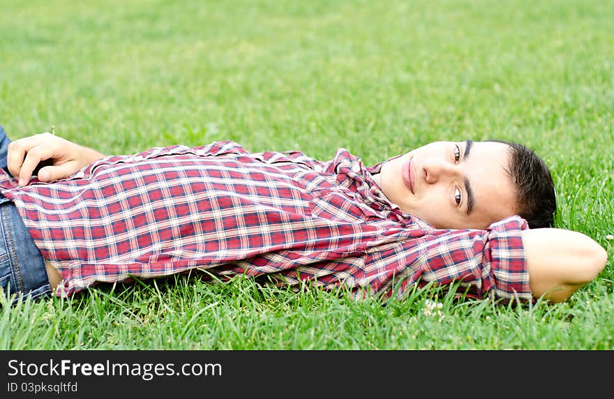 Relaxing Outdoors On The Grass