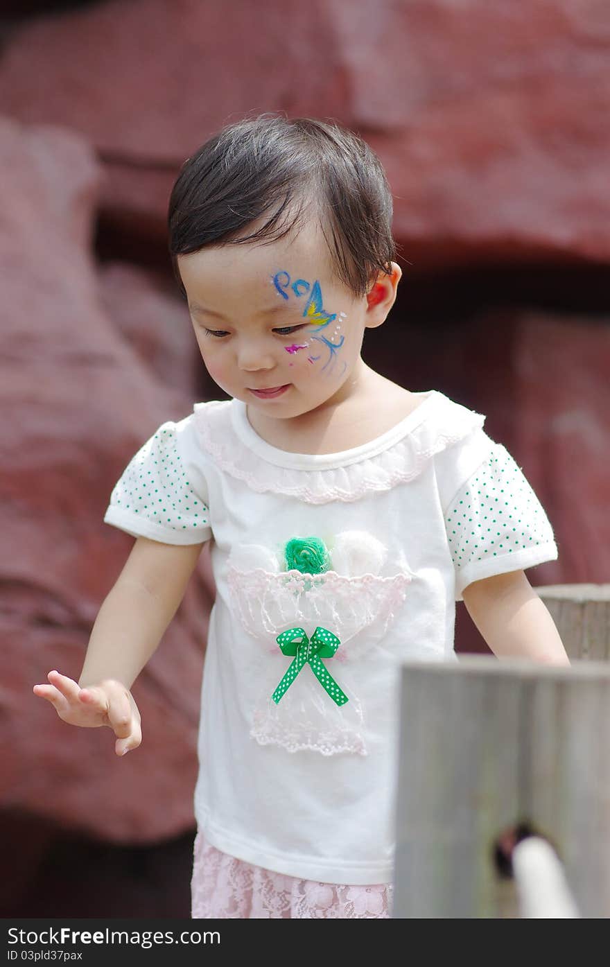 Chinese girl whith face painting. Chinese girl whith face painting