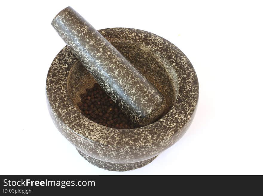 Mortar and pestle on white background