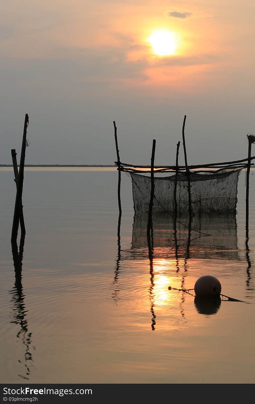 Sunrise in the haze at Pantai Sri Tujoh, Kelantan. Sunrise in the haze at Pantai Sri Tujoh, Kelantan.