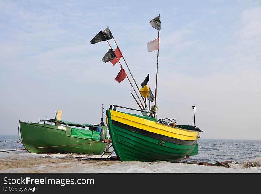 Old green fishing boats on the beach in Gdynia Orłowo. Old green fishing boats on the beach in Gdynia Orłowo