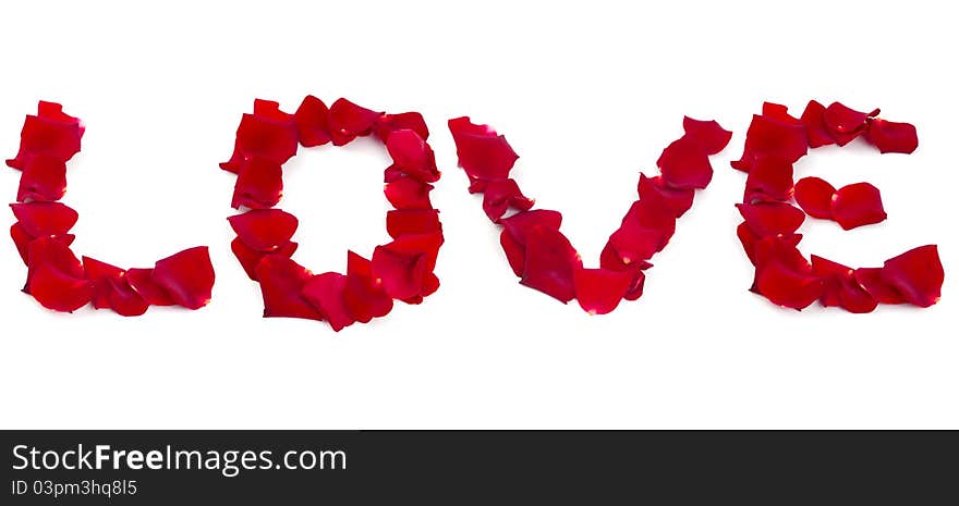 The word love of rose petals on white background