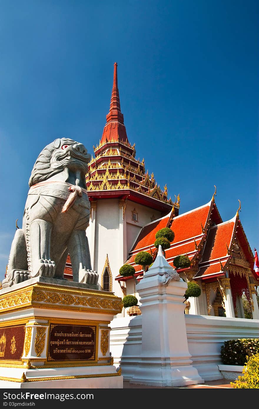 Singha statue beside buddhist church temple in Thialand. Singha statue beside buddhist church temple in Thialand