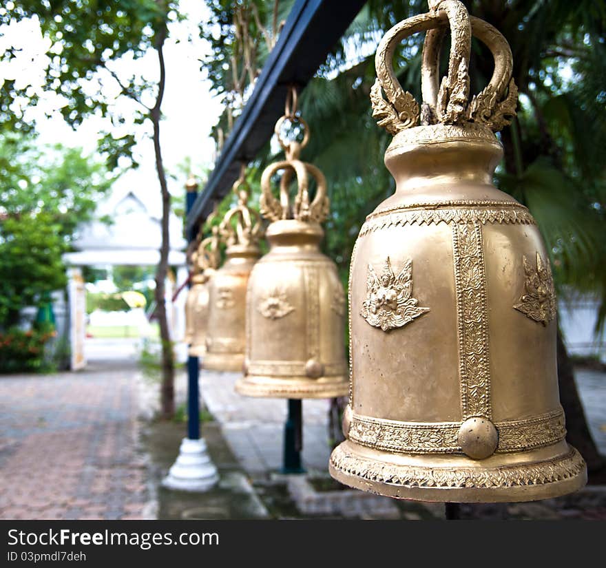 A close up row of bell in Buddhist temple. A close up row of bell in Buddhist temple.