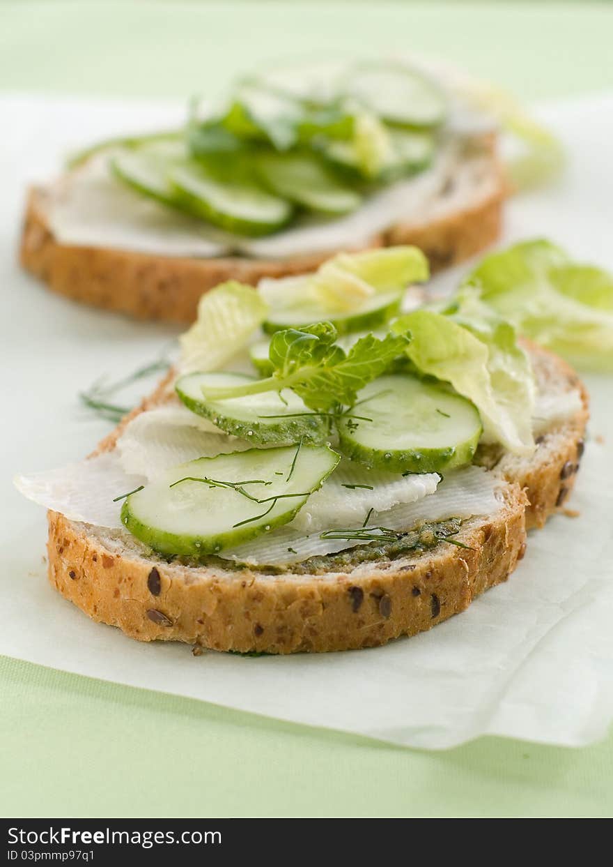 Wholegrain healthy sandwich with cucumber and cabbage. Selective focus