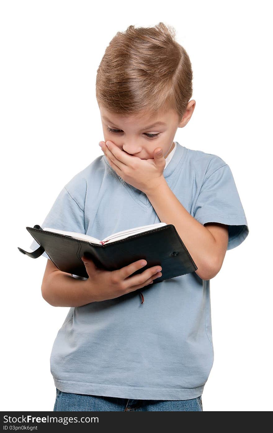 Portrait of a little boy holding a books over white background. Portrait of a little boy holding a books over white background