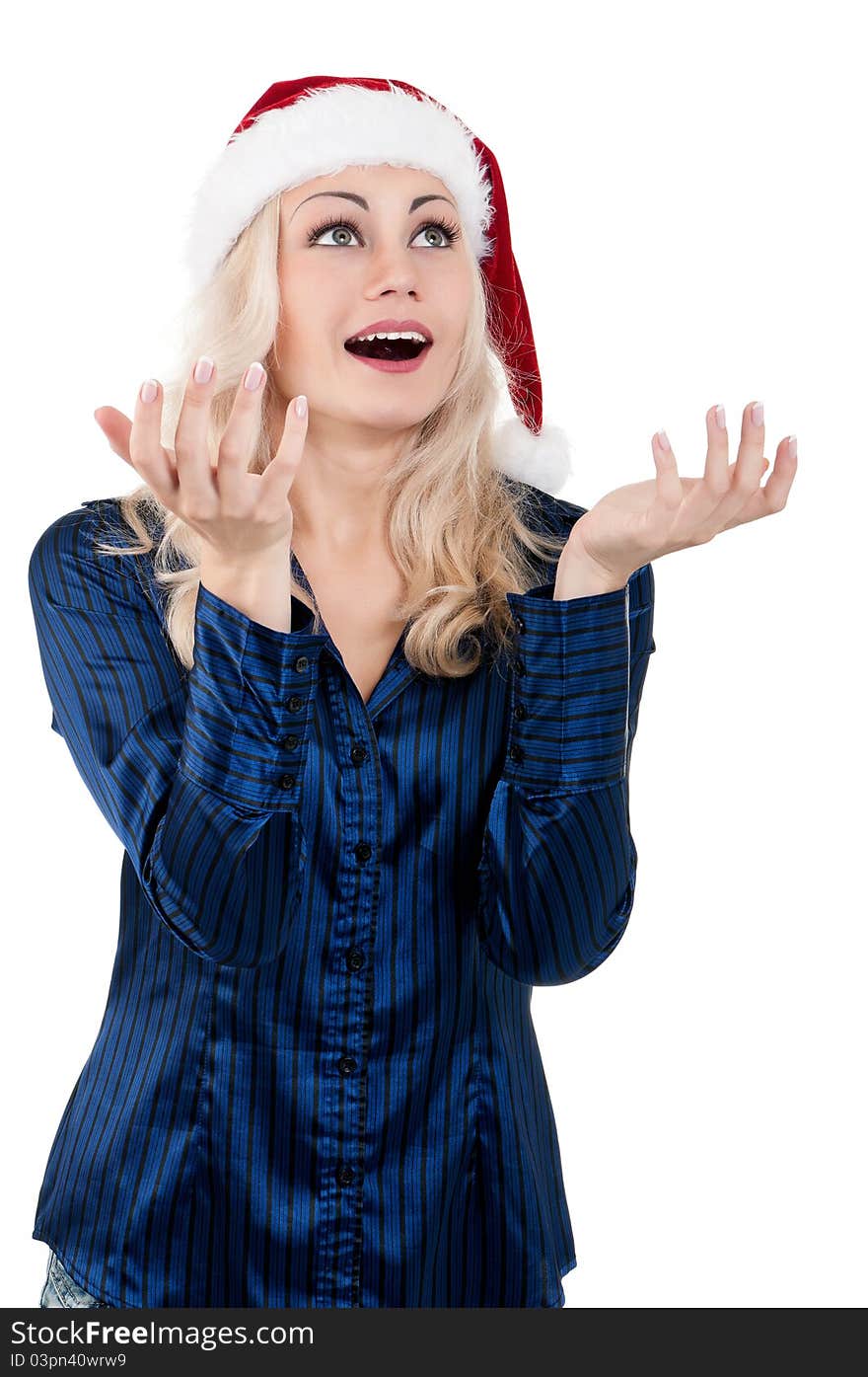 Portrait of a emotional beautiful christmas girl wearing Santa hat. Isolated on white background.